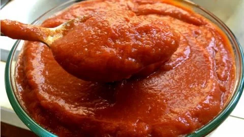 Bottle of homemade ketchup made from fresh ingredients