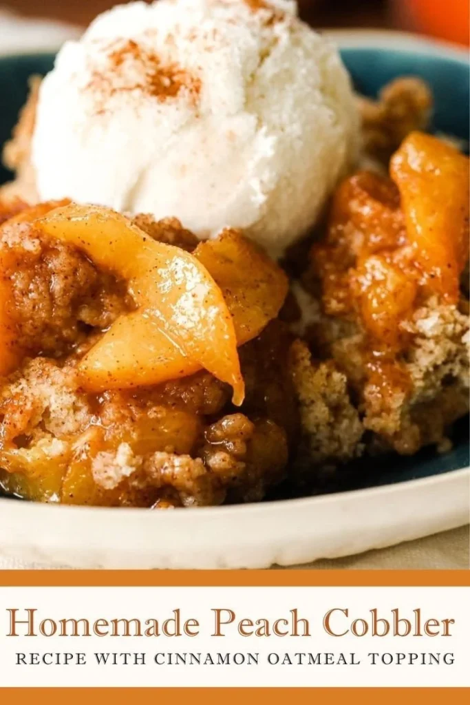 Freshly baked homemade peach cobbler topped with golden crust and ripe peaches.
