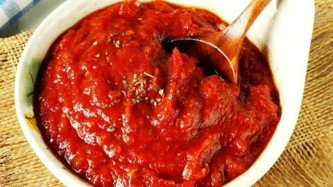 Homemade pizza sauce with fresh ingredients in a bowl