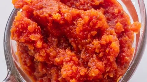 Homemade tomato paste made from fresh tomatoes, rich in flavor and color