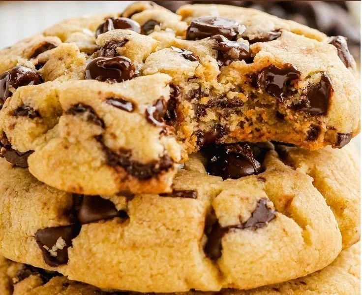 Batch of delicious brown butter chocolate chip cookies on a baking sheet