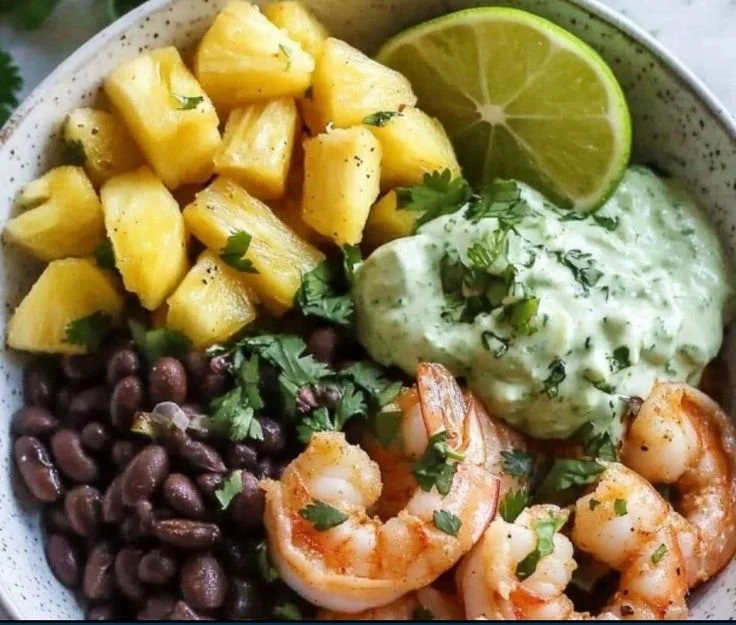 Jamaican Jerk Shrimp served with avocado and mango-black bean mix