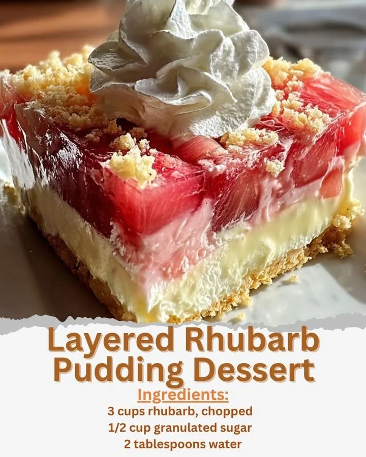 Delicious layered rhubarb pudding dessert served in a glass dish.