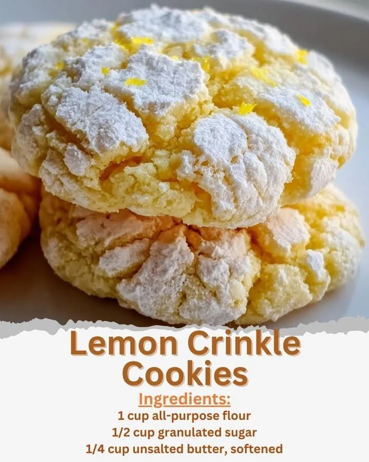 Freshly baked Lemon Crinkle Cookies dusted with powdered sugar