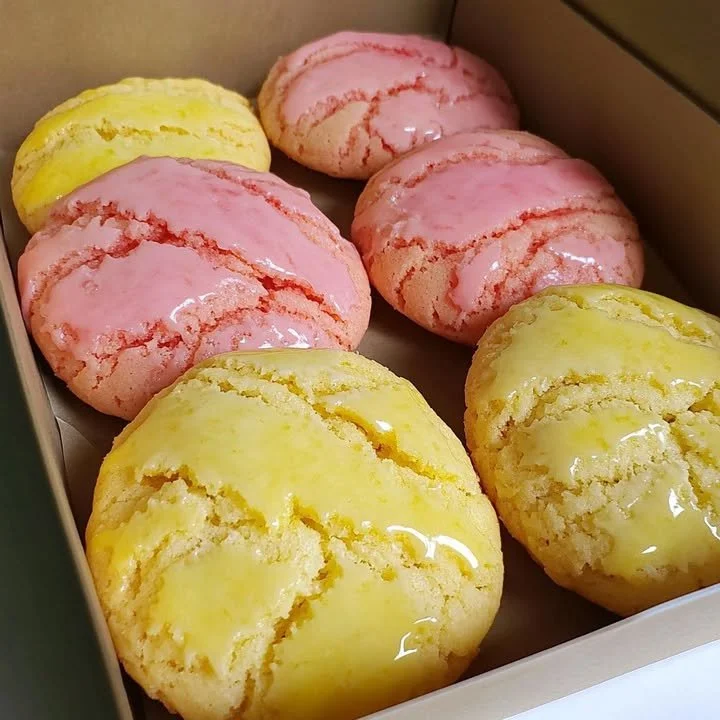 Lemon and strawberry pound cookies freshly baked and arranged on a plate