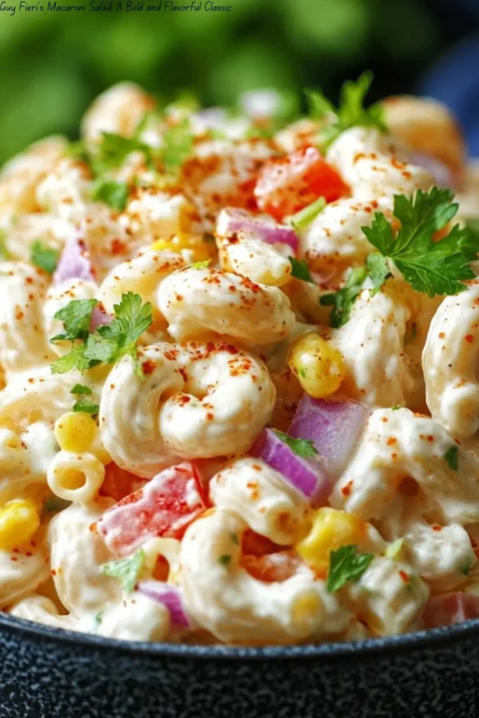 Colorful bowl of macaroni salad with vegetables and dressing