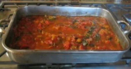 Delicious oven-roasted tomato sauce in a bowl, perfect for pasta dishes