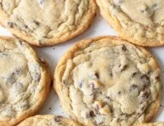 Freshly baked perfect chocolate chip cookies on a plate
