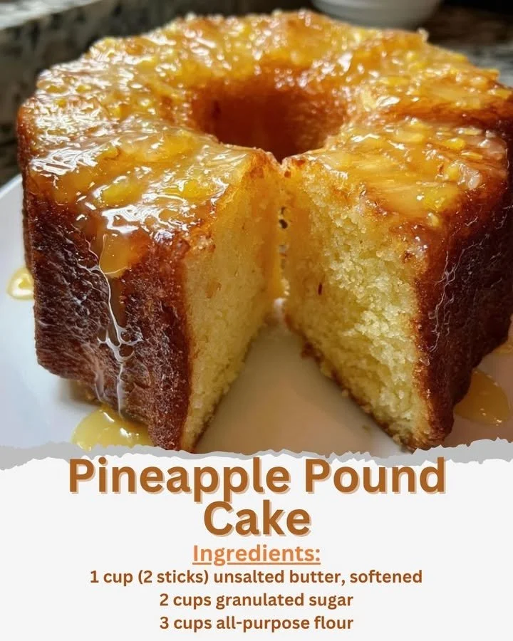 Delicious slice of pineapple pound cake served on a plate with tropical garnishes.