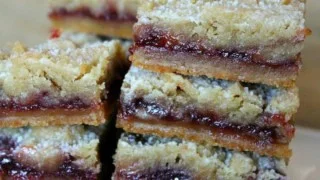 Delicious Raspberry Shortbread Bars with a buttery shortbread crust and raspberry filling