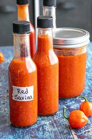 Bottle of Red Savina Habanero hot sauce with a vibrant label