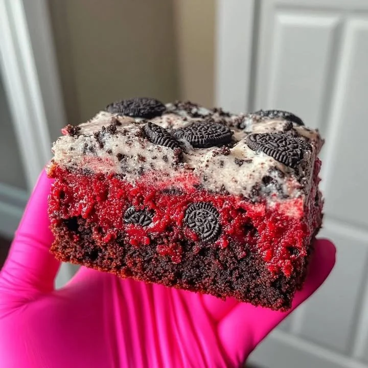 Red velvet brownie layered with cookies and cream for a delicious dessert.