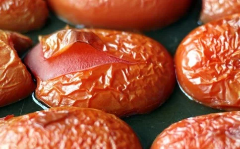 Delicious roasted tomatoes served in a bowl