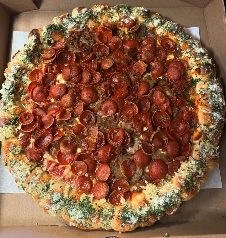 Roni Cup Meatlovers Pizza with Garlic Knot Crust showcasing delicious toppings