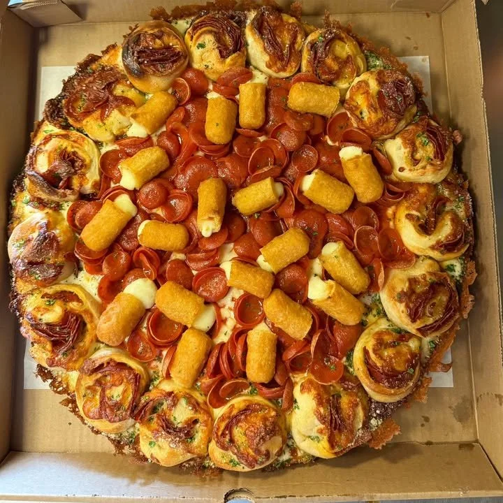 Roni Cup & Mozza Sticks Round Sicilian Pizza, featuring rich toppings and a crispy crust