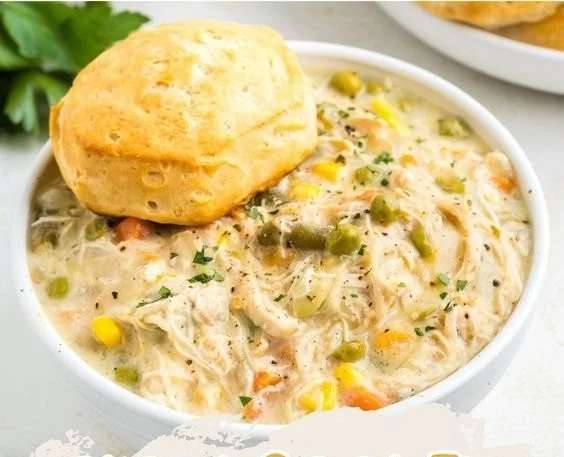 Delicious Slow Cooker Chicken Pot Pie with vegetables and flaky crust