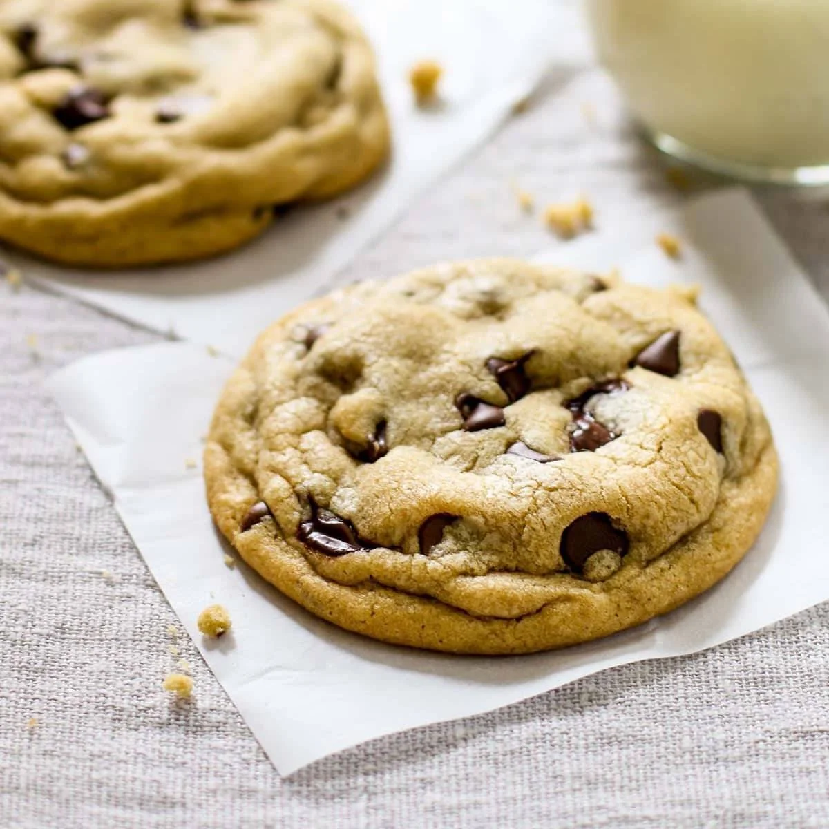 Freshly baked soft chocolate chip cookies on a cooling rack