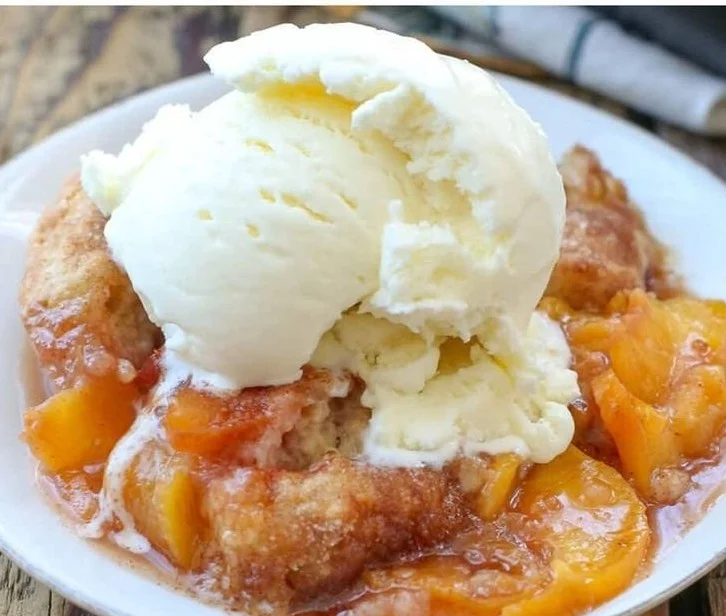Delicious Southern peach cobbler with golden crust and fresh peaches