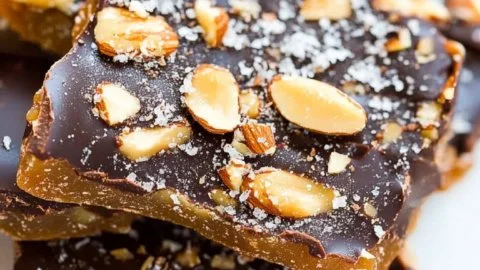 Delicious toffee topped with almonds, a delightful sweet treat.