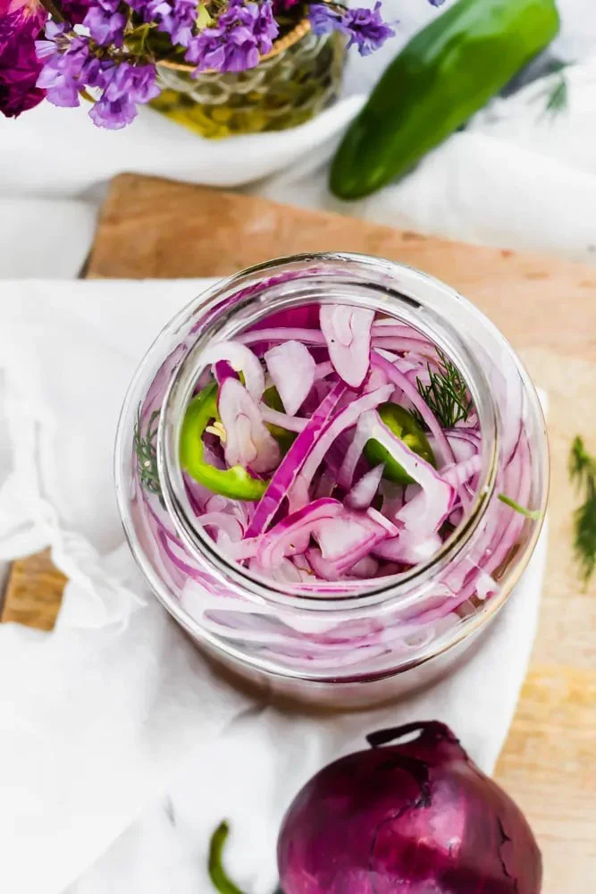 Homemade apple cider vinegar pickled onions in a jar