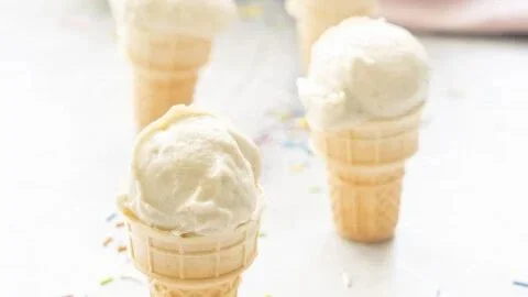 Delicious bowl of homemade banana ice cream garnished with fresh banana slices