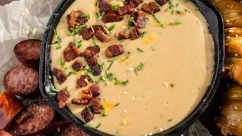 Delicious Beer Cheese Dip with Bacon served in a bowl