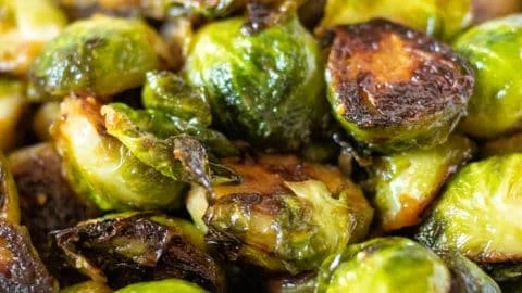 Deliciously roasted Brussels sprouts served on a platter.