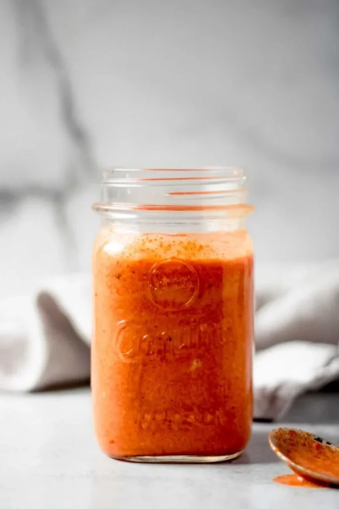 Buffalo Ranch Wing Sauce in a bowl with wings