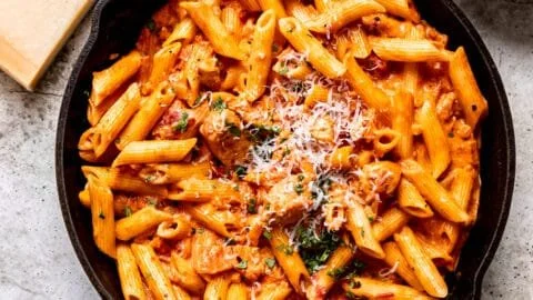 Easy creamy Cajun chicken pasta served in a bowl with herbs and spices