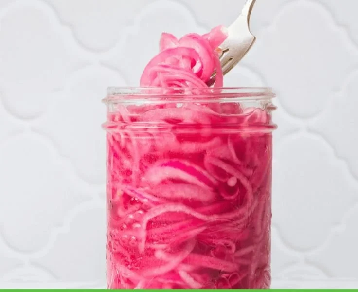 Jar of easy pickled red onion ready to serve