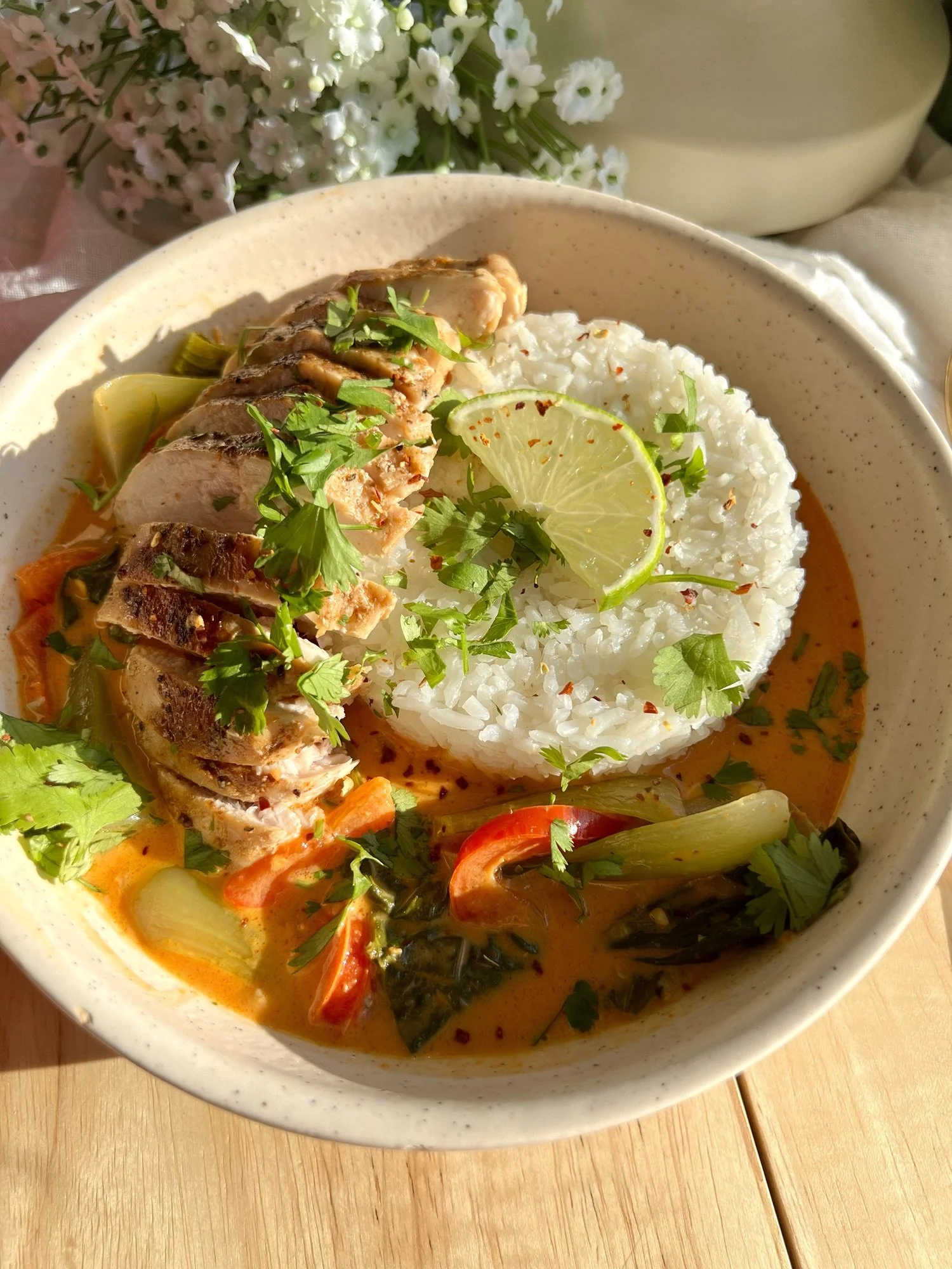 Bowl of easy Thai red curry with vegetables and rice