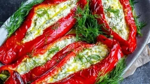Colorful feta stuffed peppers filled with fresh ingredients