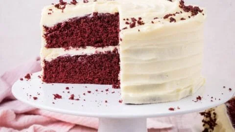 Delicious gluten-free red velvet cake topped with cream cheese frosting