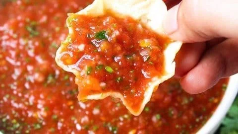 Bowl of homemade salsa with fresh ingredients and tortilla chips