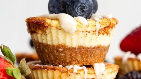 Delicious Keto Cinnamon Roll Cheesecakes topped with cinnamon and cream cheese.