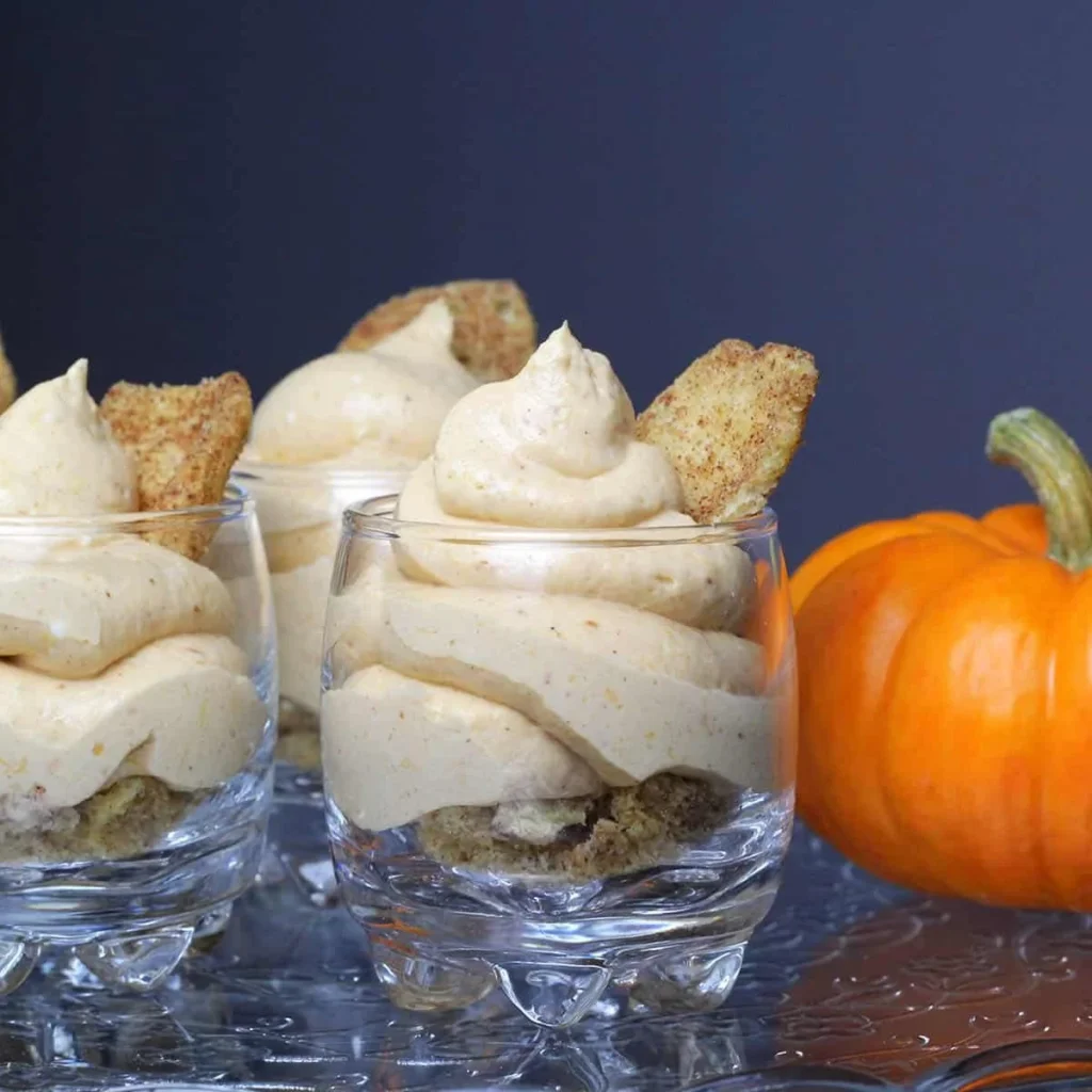 Delicious Keto Pumpkin Cheesecake Mousse topped with whipped cream