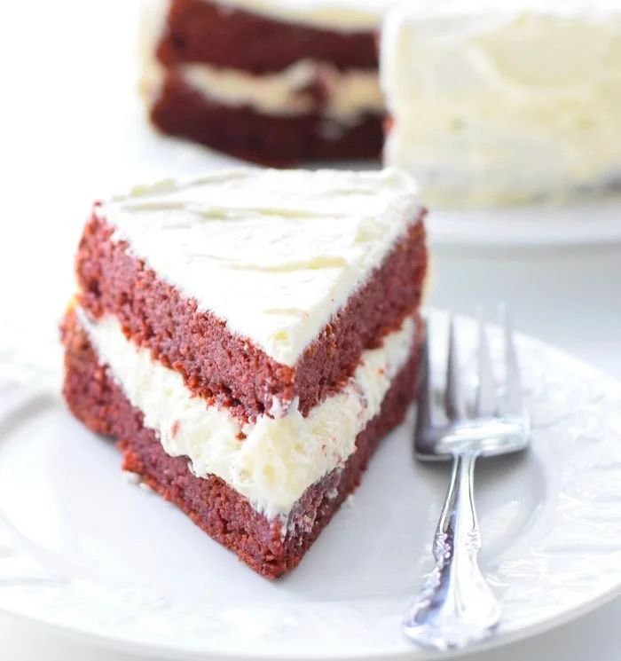 Delicious keto red velvet cake topped with cream cheese frosting