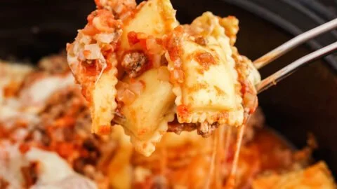 Lazy Day Lasagna topped with cheese and herbs in a baking dish