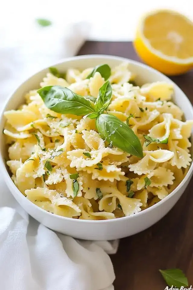 Bowl of delicious Lemon Basil Pasta Salad with fresh ingredients.