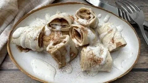 Delicious low carb high protein tortilla cinnamon rolls on a plate