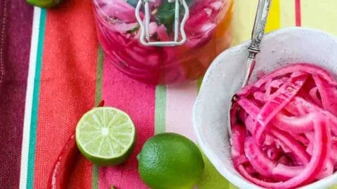 Delicious jar of homemade Mexican pickled red onions ready to enhance dishes