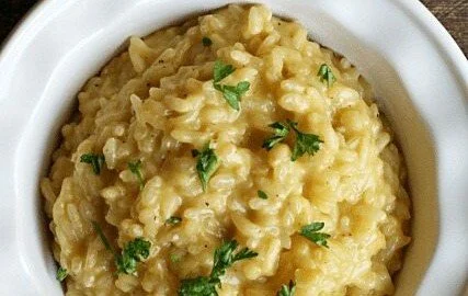 Creamy Parmesan Risotto served in a bowl, garnished with parsley