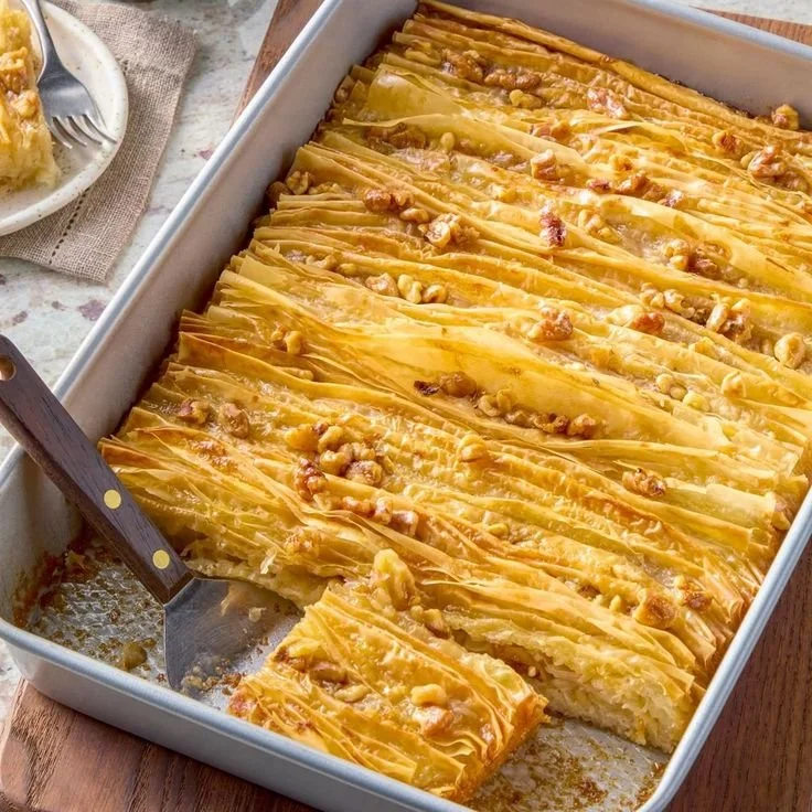 Delicious Phyllo Crinkle Cake with flaky layers and rich filling.