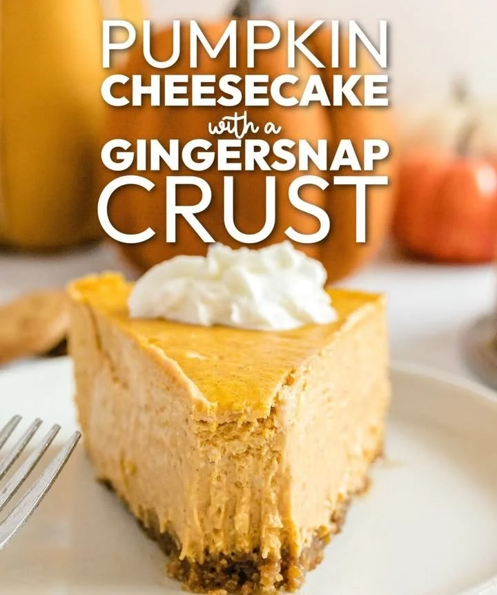 Delicious pumpkin cheesecake with a crunchy gingersnap crust on a dessert plate.