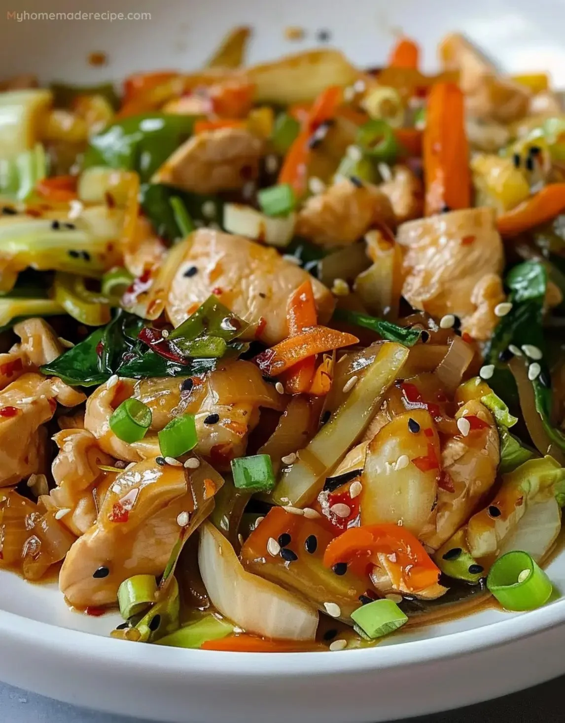 Quick chicken cabbage stir-fry with colorful vegetables in a creamy sauce