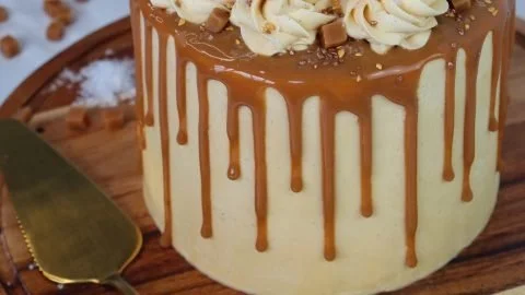 Delicious homemade Salted Caramel Cake with drizzling caramel on top