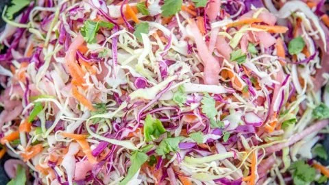 Smoked pickled onion coleslaw served in a bowl