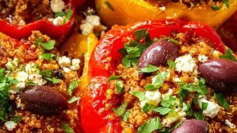 A vibrant plate of spicy Mediterranean unstuffed peppers with fresh herbs and spices.