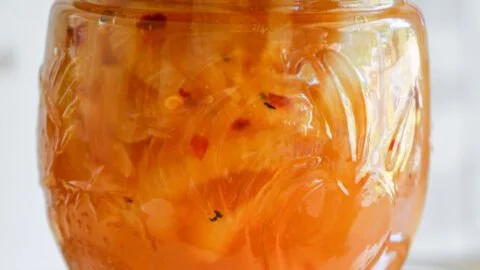 Spicy sweet onion marmalade served with cheese and crackers