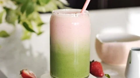 Refreshing Strawberry Matcha Latte drink topped with strawberries